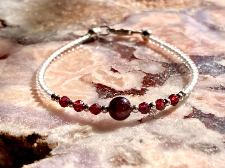 Analyzing image      January Garnet birthstone bracelet