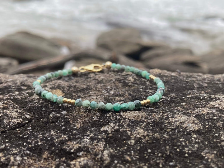 Emerald and gold bracelet