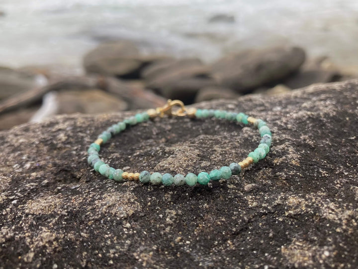 Emerald and gold bracelet